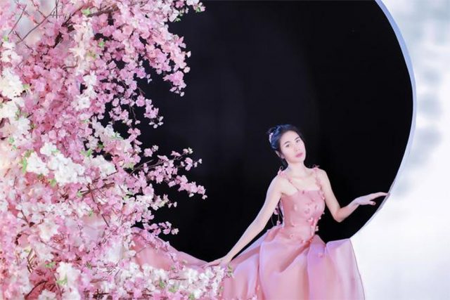 thuy tien in pink dress and flowers