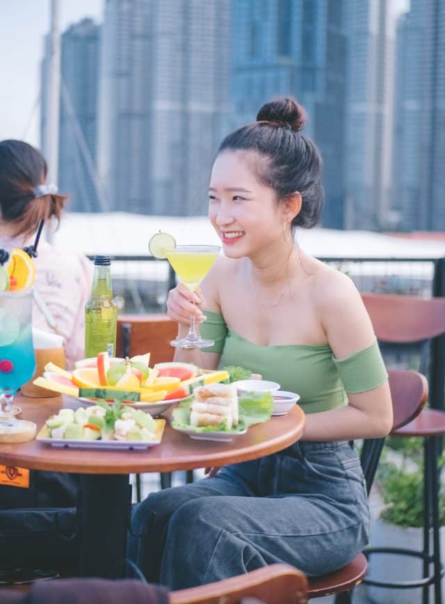 girl eating in saigon