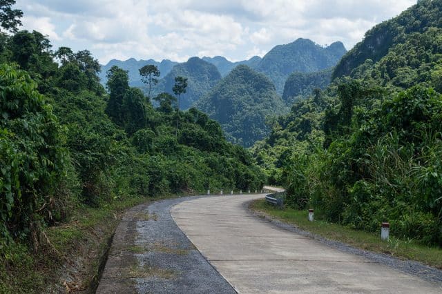 Road and Limestone Formations with Motorcycle, Dong Hoi, Vietnam