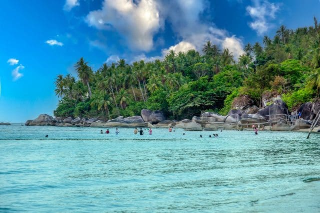 A crowd of tourists bathing on the sea at Hon Son, Nam Du